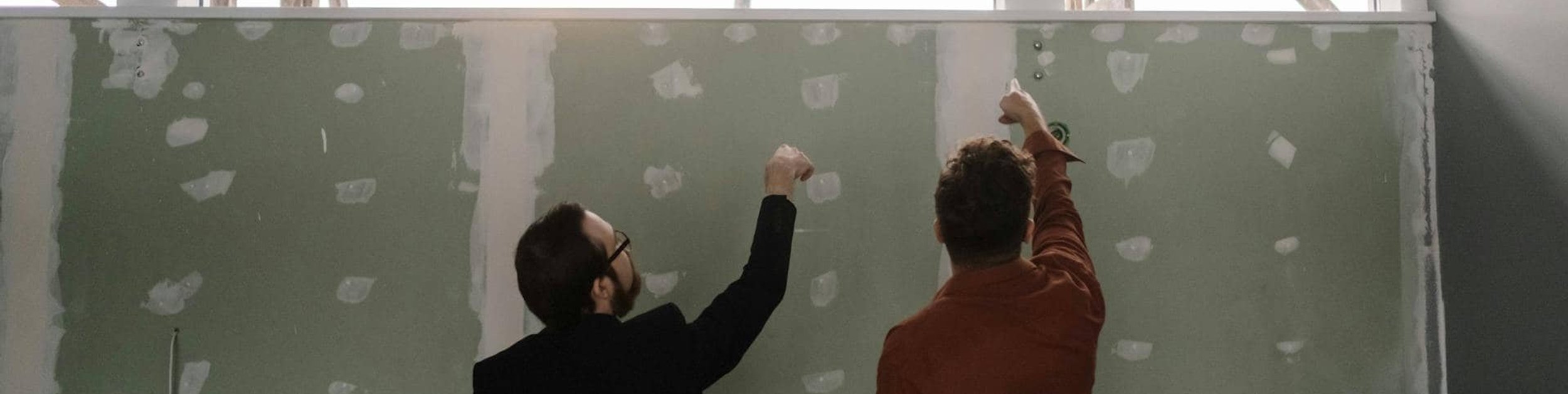 Two men working together